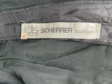 the label on the back of a jacket that says scherrerr boutique