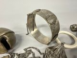 a lot of silver items that are on a table