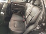 the back seats of a car are black in color