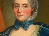 portrait of a woman in a blue dress and a blue cape