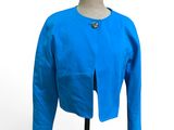 blue cropped jacket on a mannequin base