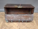 an old wooden trunk sitting on top of a parquet floor