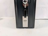 an image of a beer dispenser on a table