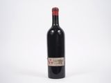 a bottle of wine that is sitting on a table