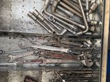 a box full of wrenches and other tools in it