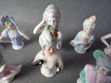 many figurines that are sitting on a table