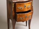 an image of a marble topped chest of drawers