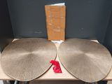 two drums sitting on top of a table next to each other