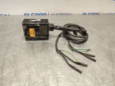 a photo of an electric switch with wires and wires