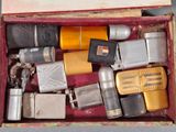 a box full of different types of lighters and lighters