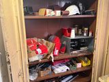 a cabinet with many items on it in a room