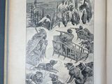 an open book with a picture of people and animals on it