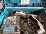 a blue tool box with tools inside of it