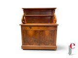 an image of a wooden cabinet with a door
