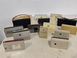 a lot of electronic devices sitting on a table