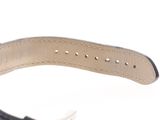 an image of a close up of a watch on a white surface