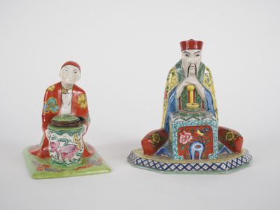 pair of chinese figurines of a man and a woman