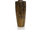 une image représentant un vase orné d'un motif de bambou