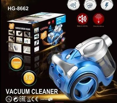 an image of a blue vacuum cleaner with a box and instructions
