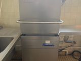 an image of a kitchen with a sink and a dishwasher