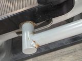 a close up of a metal object on a machine