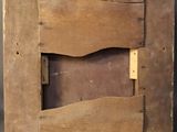 a picture of an old wooden picture frame on the wall