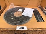 a cardboard box that has a roll of black tape in it