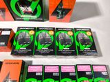 many boxes of vapors on a table with a white table cloth