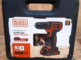 une perceuse-visseuse sans fil Black & Decker dans une mallette à outils Black & Decker