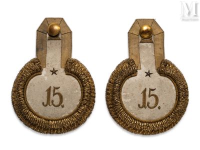 pair of gold - plated earrings with the number 15 on them