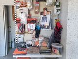 many items on the shelf in the garage