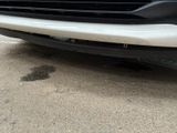 a close up of the front bumper of a car