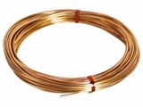 a coil of copper wire on a white background