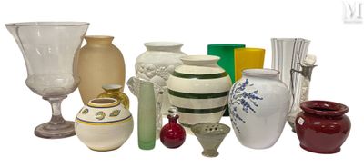 many different types of vases and vases on the table