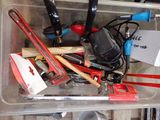 a plastic container filled with various tools and tools