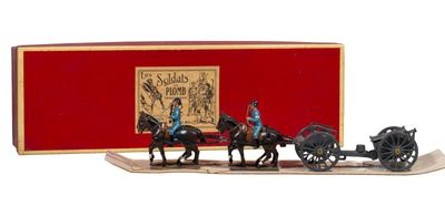 figurines représentant des chevaux tirant une calèche avec un homme à son bord