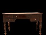 an old wooden desk with three drawers and a drawer underneath it