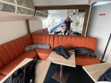 someone is taking a picture of themselves in the mirror of a camper