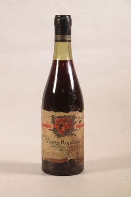 a bottle of wine that is sitting on a table