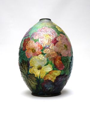 a colorful vase with flowers painted on it on a white background