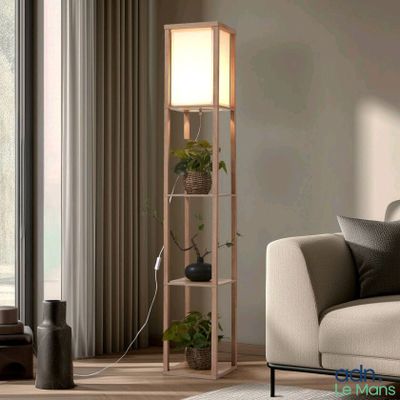 a living room with a couch and a lamp in it