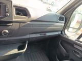 a view of the inside of a vehicle from the driver ' s seat