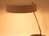 a close up of a lamp that is on a table