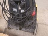 a picture of a machine that is sitting on the ground