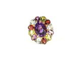 an image of a close up of a purple ring with multi colored stones