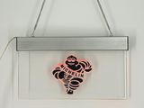 neon sign hanging from a metal frame with a cartoon character on it