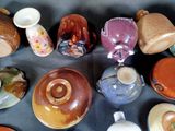 many different types of cups and saucers on the table