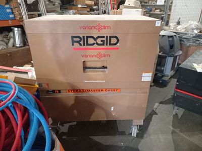 a cardboard box that is sitting on top of a cart