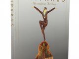 a book with a statue of a woman on a rock