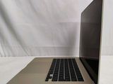 a laptop computer sitting on a table with a white background